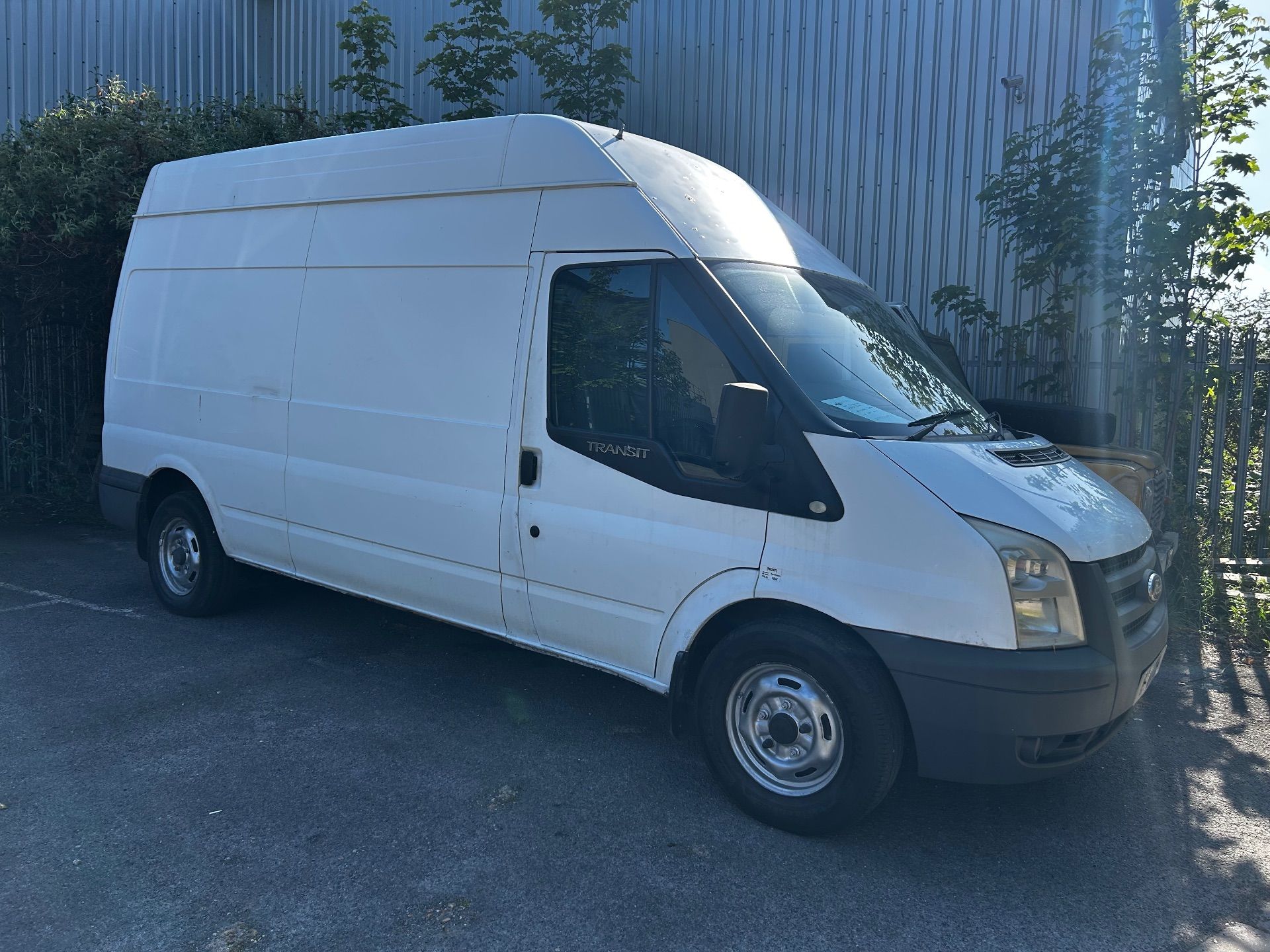White Ford Transit Van
